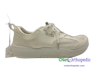 Shoe lift added to a men's white Lems sneaker