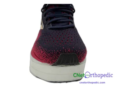 Shoe lift added to a women's black Brooks Ghost sneaker