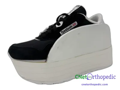 Shoe lift added to a men's Reebok sneaker