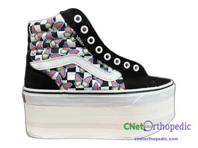 Shoe lift added to a women's Vans sneaker