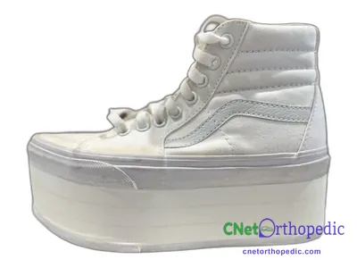 Shoe lift added to a women's white Vans SK8-Hi sneaker