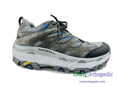 Shoe lift added to a men's grey Merrell sneaker