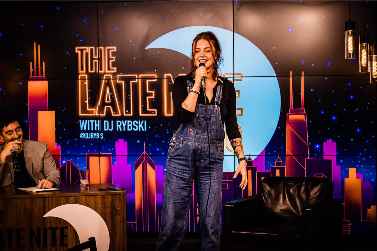 Comedian performing at The Late Nite open mic show at The Comedy Bar