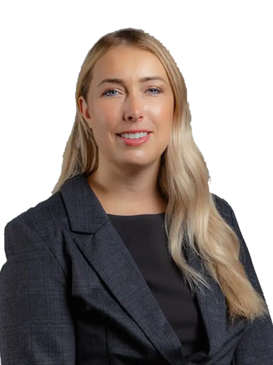 Professional woman with blonde hair in a dark blazer smiling at the camera.