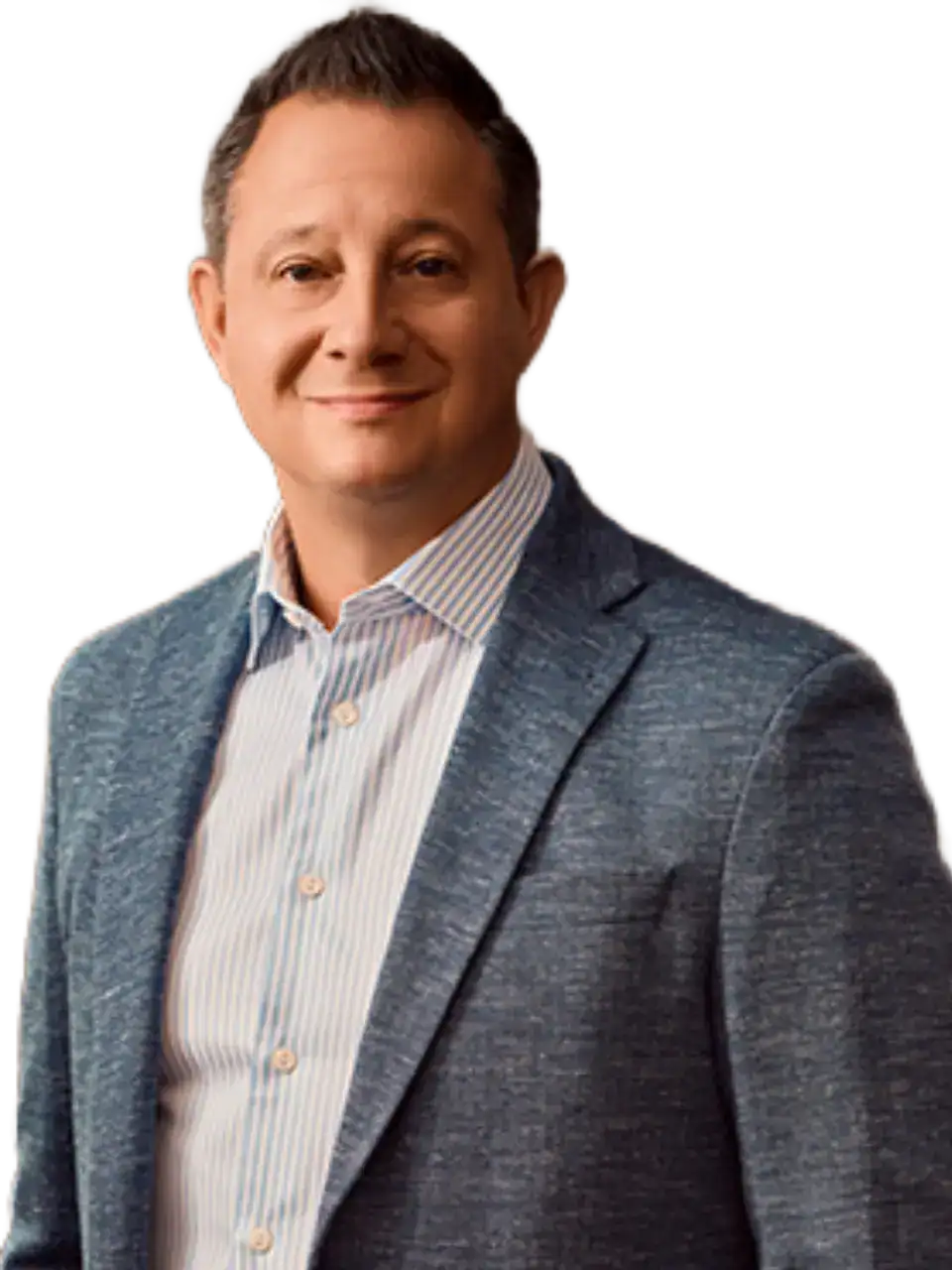 Professional man in a blue blazer smiling for a corporate photo.