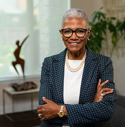 Professional photo of a smiling Sharon Cooper, MD
