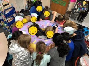 donut classroom transformation students all pretend to eat giant blow up donut