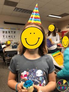 kid with party hat on