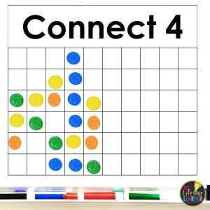 whiteboard with connect 4 board drawn on it with expo marker