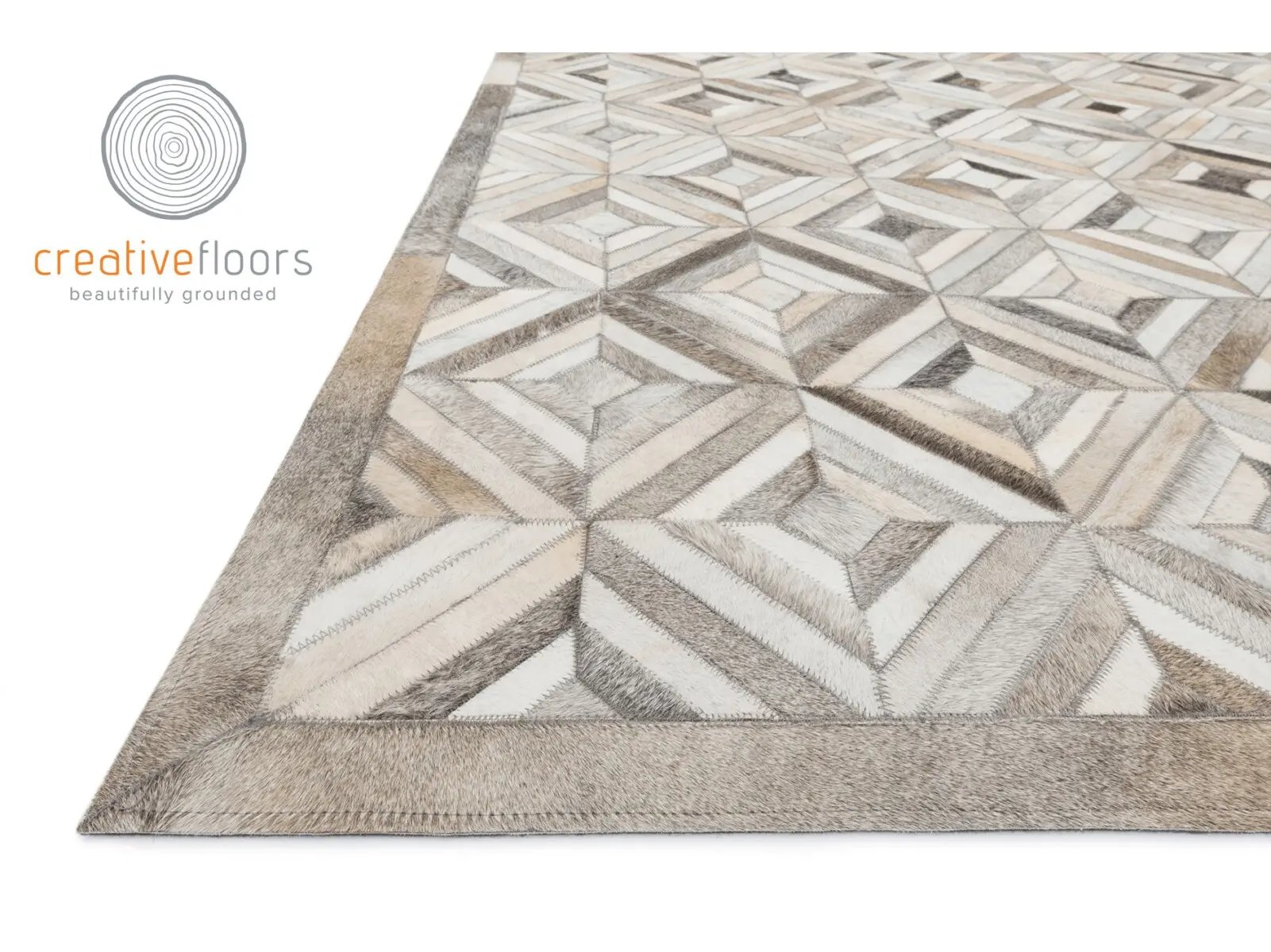 Intricate geometric area rug with natural tones, perfect for stylish home flooring in Vail.