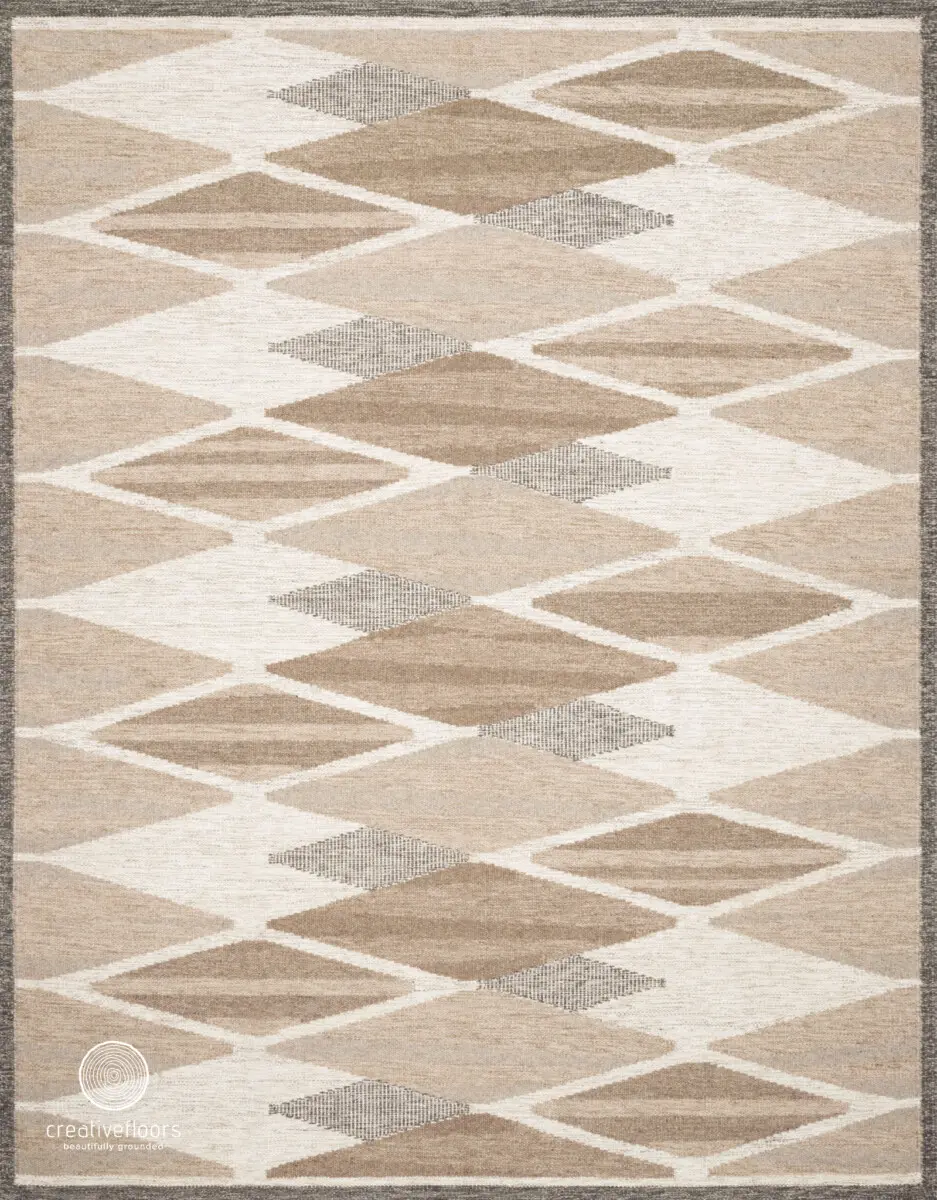 Modern geometric area rug with neutral beige, cream, and gray tones, perfect for contemporary living spaces.
