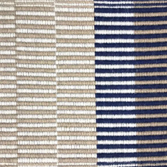 Soft beige and navy striped rug showcasing high-quality, durable flooring options by Creative Floors.