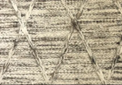 High-quality textured carpet flooring with intricate woven details for stylish interiors.