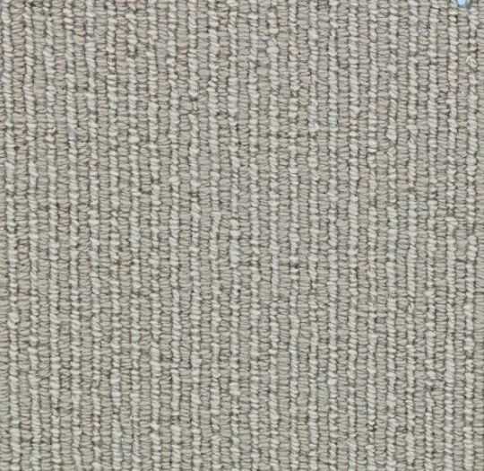 Soft beige textured carpet with durable plush fibers for residential and commercial flooring solutions.