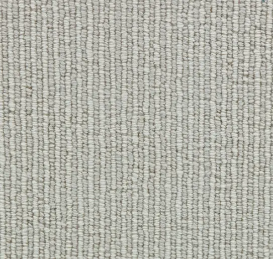 Soft beige textured carpet suitable for home and office flooring.