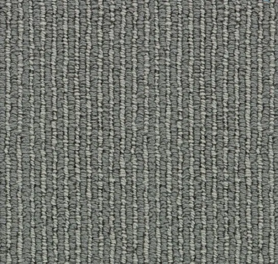 Modern gray commercial carpet flooring with textured loop pile design.