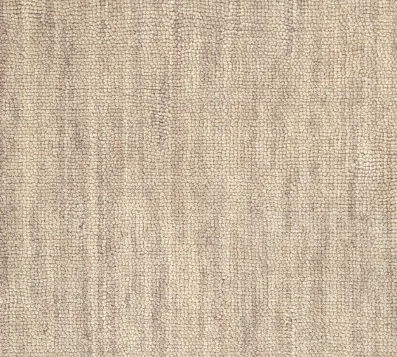 Soft beige carpet flooring with plush, textured surface for elegant home interiors.