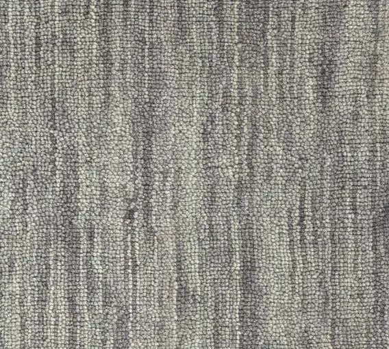 Modern textured carpet with earthy tones for residential and commercial flooring solutions.