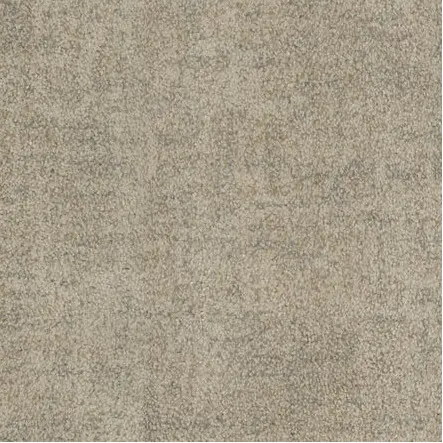 Textured beige carpet flooring for residential and commercial spaces.