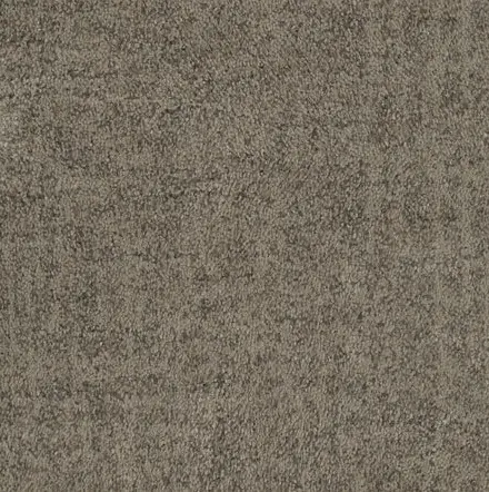 Textured beige carpet flooring in a residential space, showcasing durable and stylish design.
