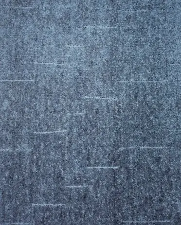 Slate grey textured flooring with a modern, durable finish for residential and commercial spaces.