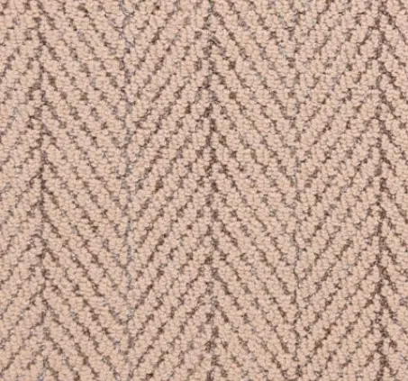 Close-up of textured beige herringbone carpet flooring at Creative Floors, Vail.