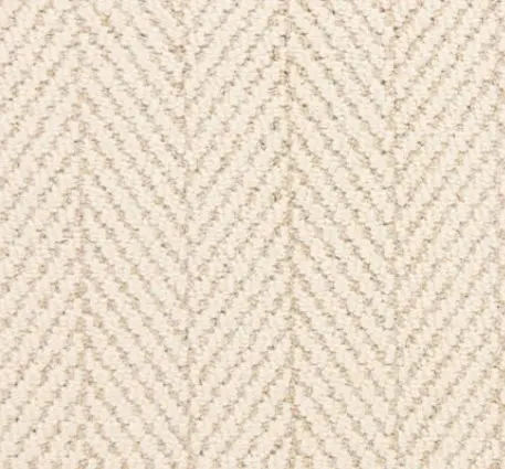 Soft beige herringbone carpet, durable flooring solution for homes and offices.