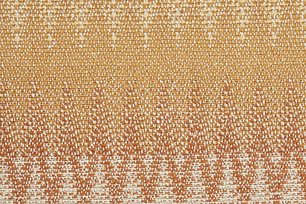 High-quality woven area rug with intricate pattern in warm tones for modern flooring solutions.