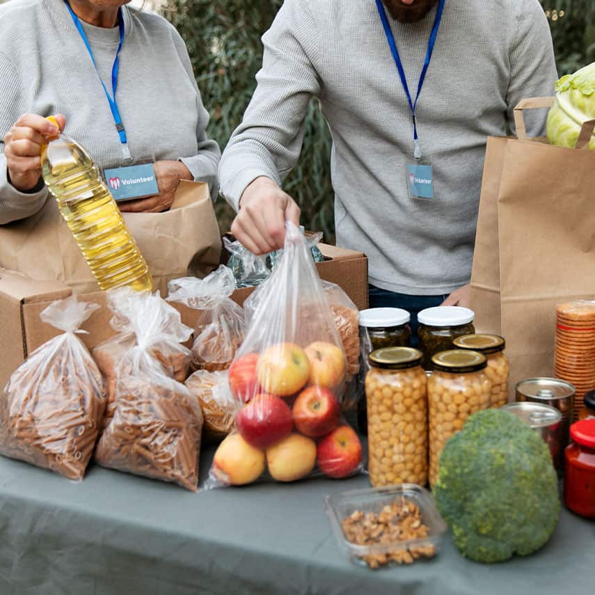 Volunteers sorting food at a Seymour food pantry, fighting hunger and giving hope - Cross Food Ministry