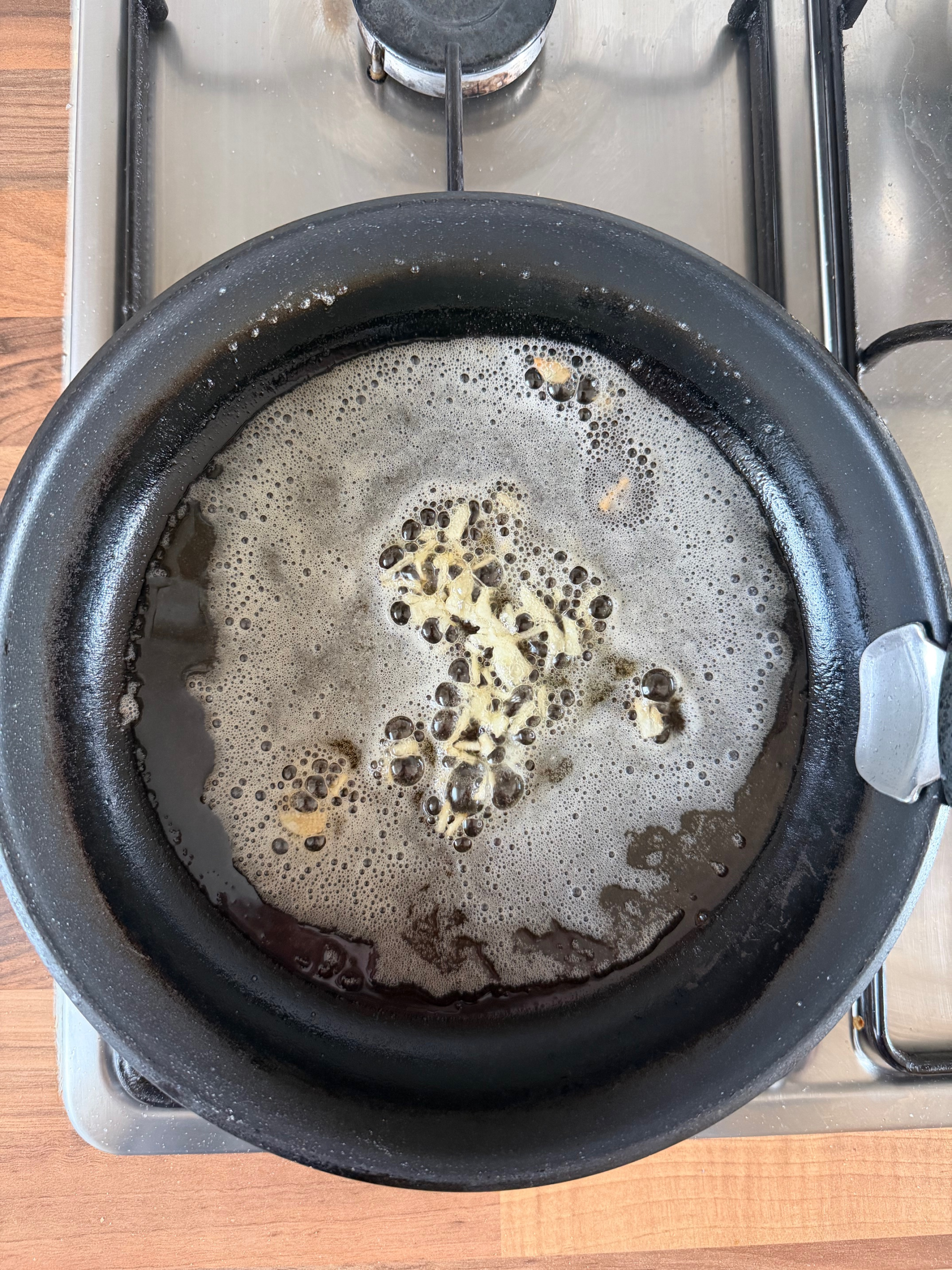 garlic cooking in a pan