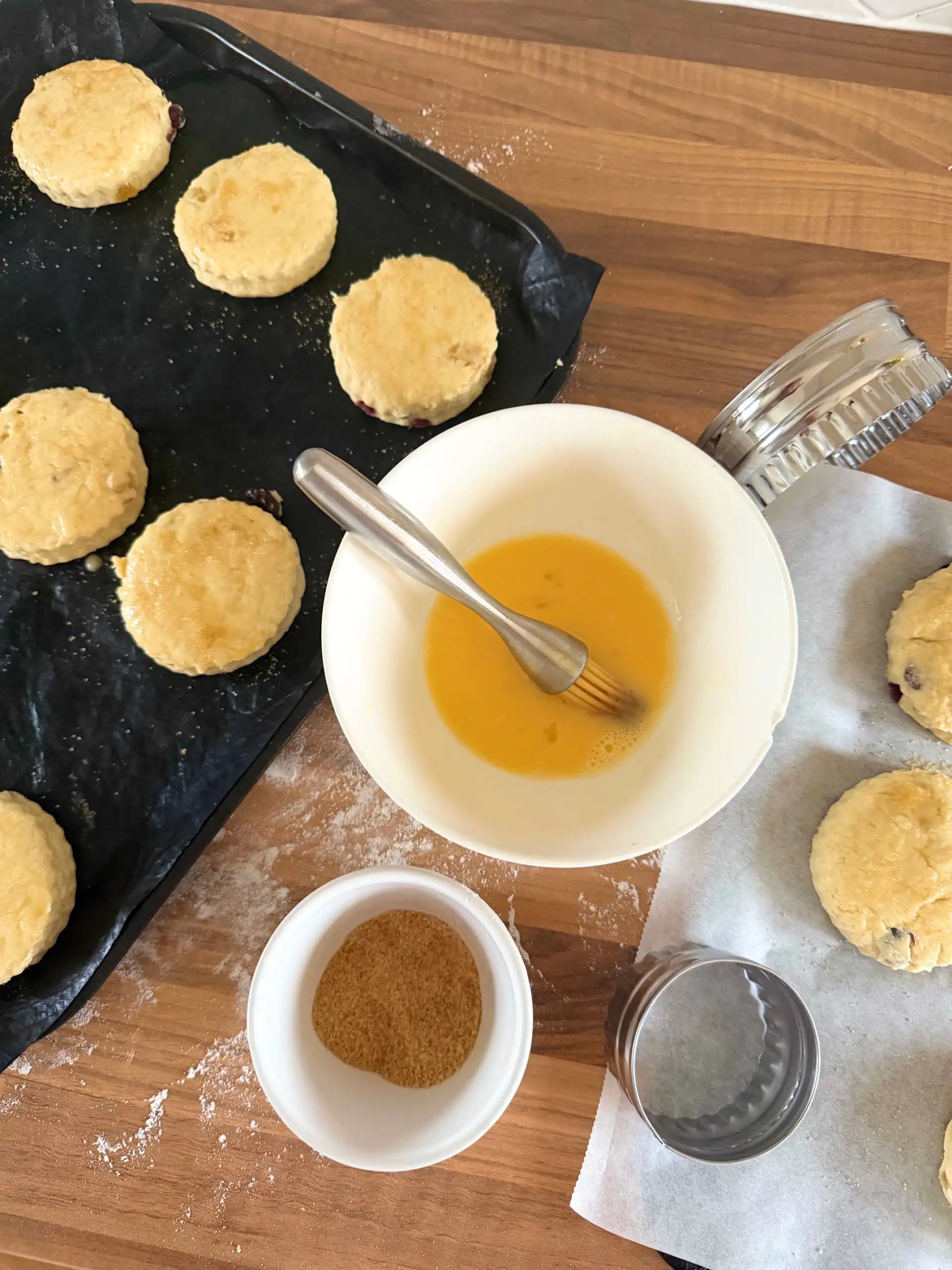 glazing the scones with egg and sugar