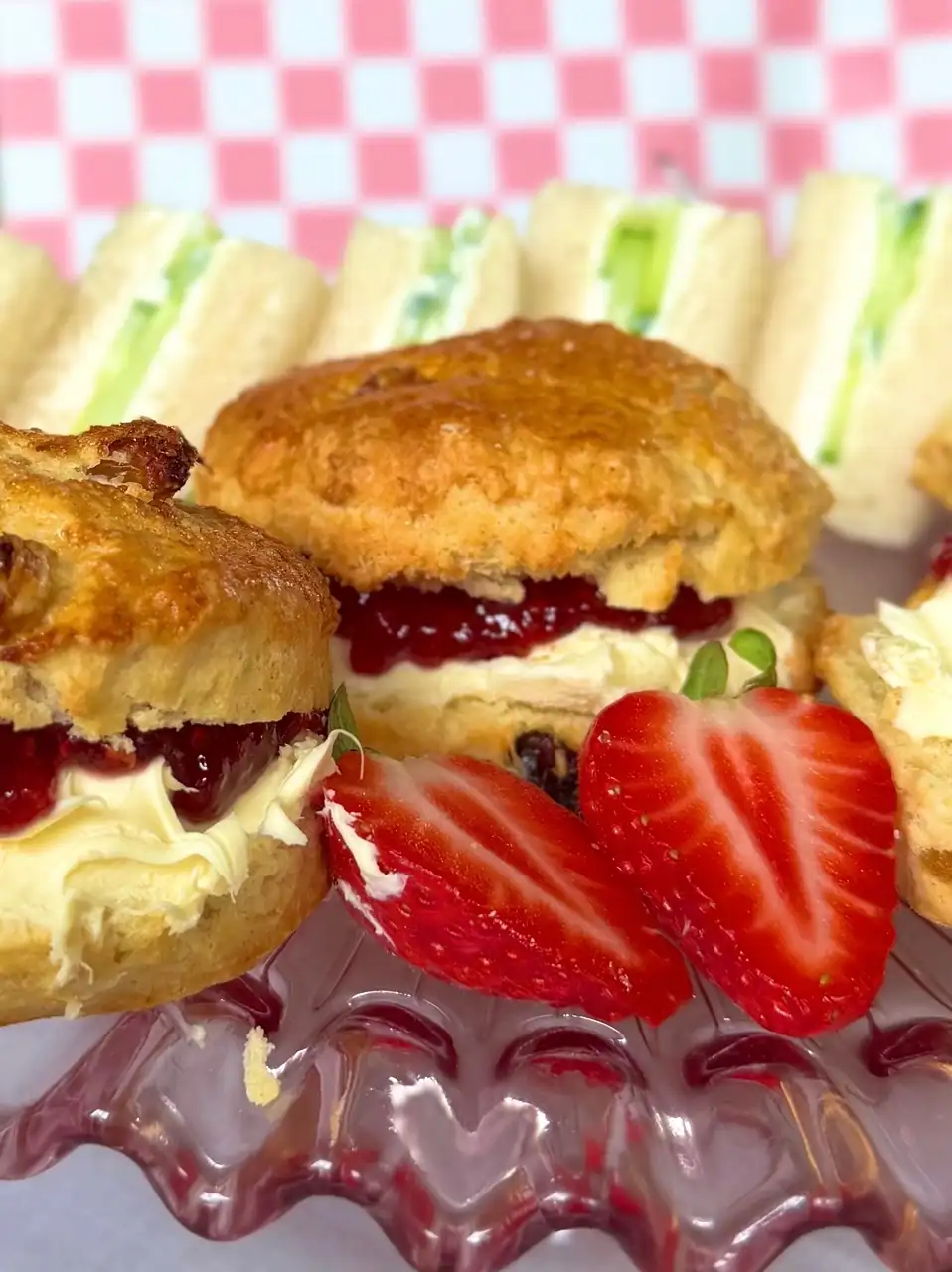 close up of scones and sandwiches