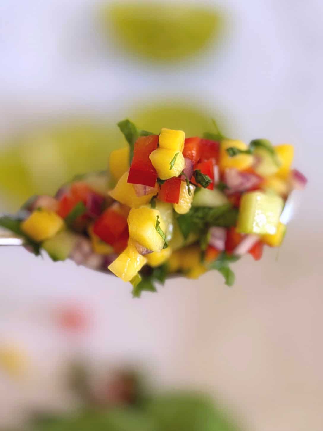 spoon of mango salsa