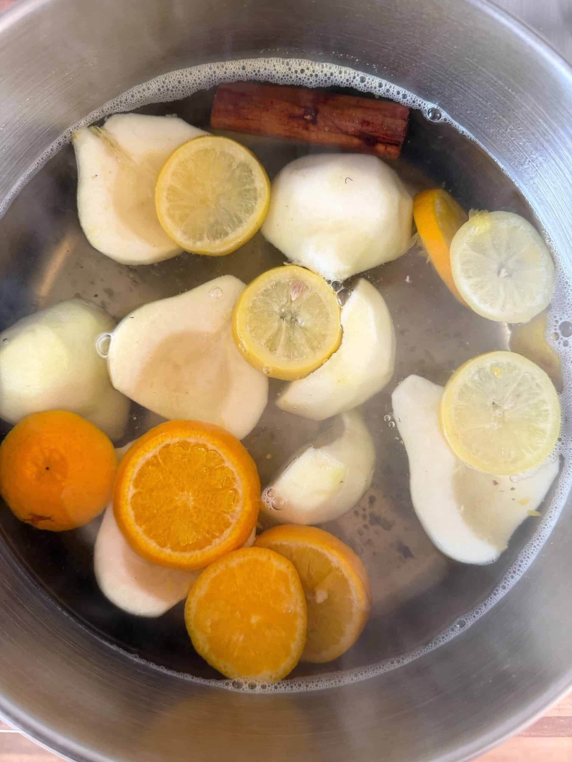 poaching pears in the poaching liquid