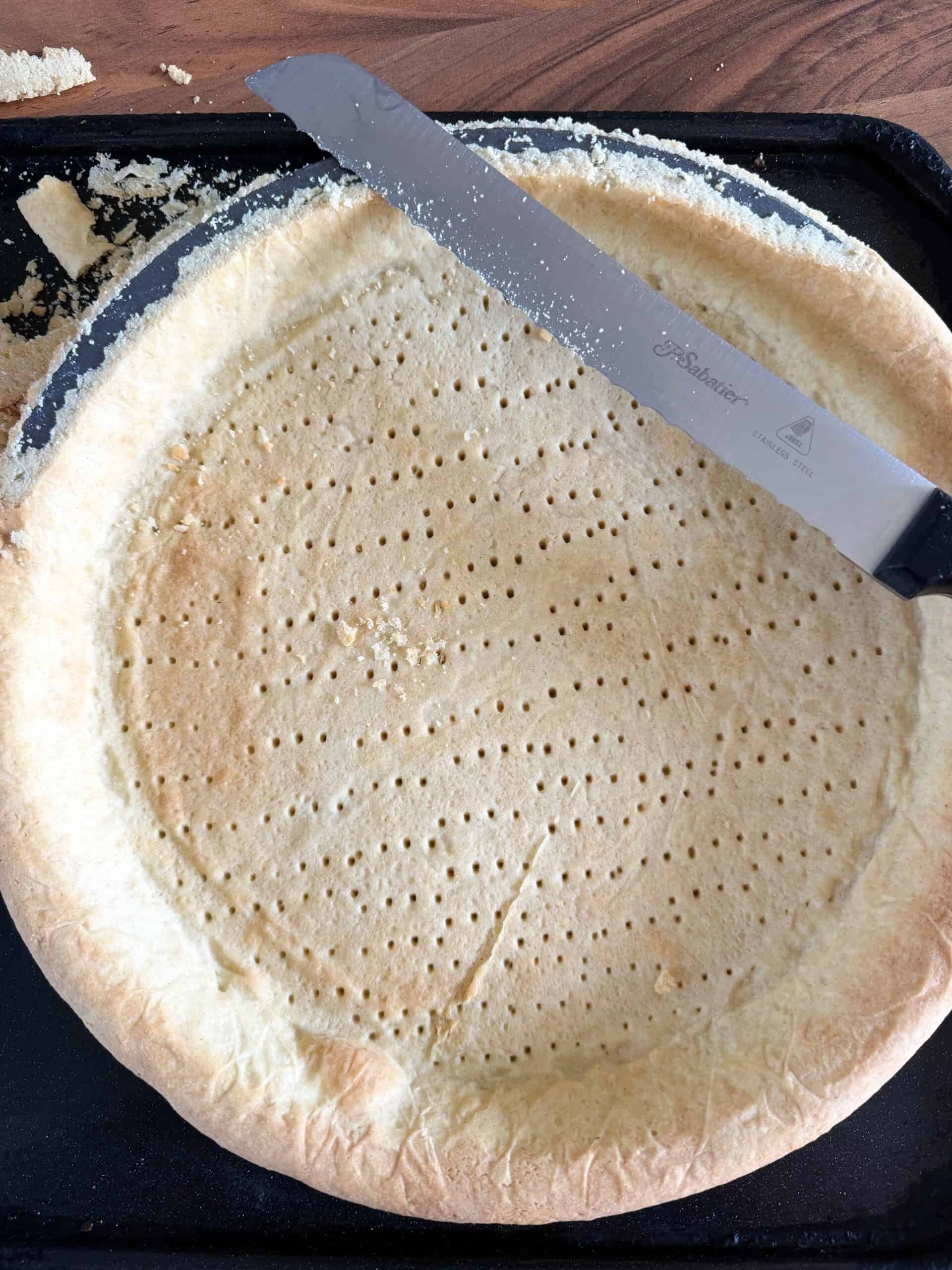 trimming pastry tart case