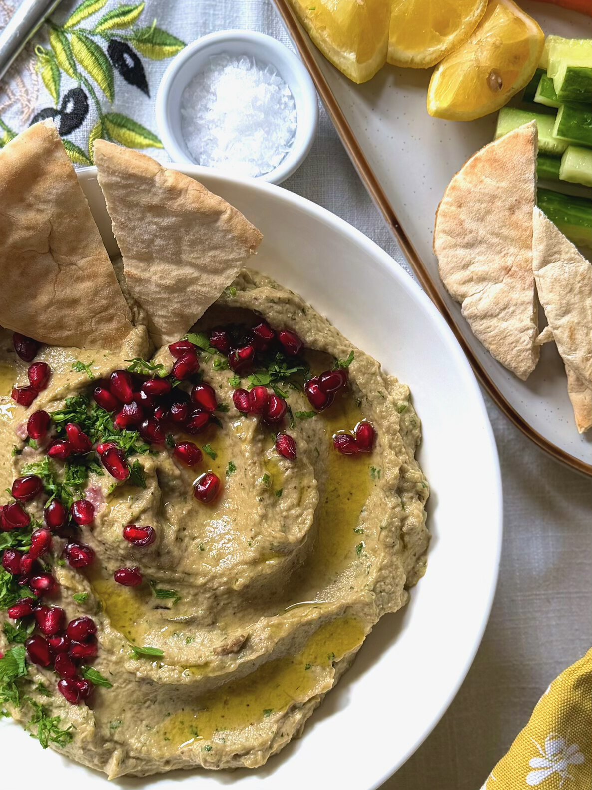 colourful baba ganoush with pitta bread and olive oil
