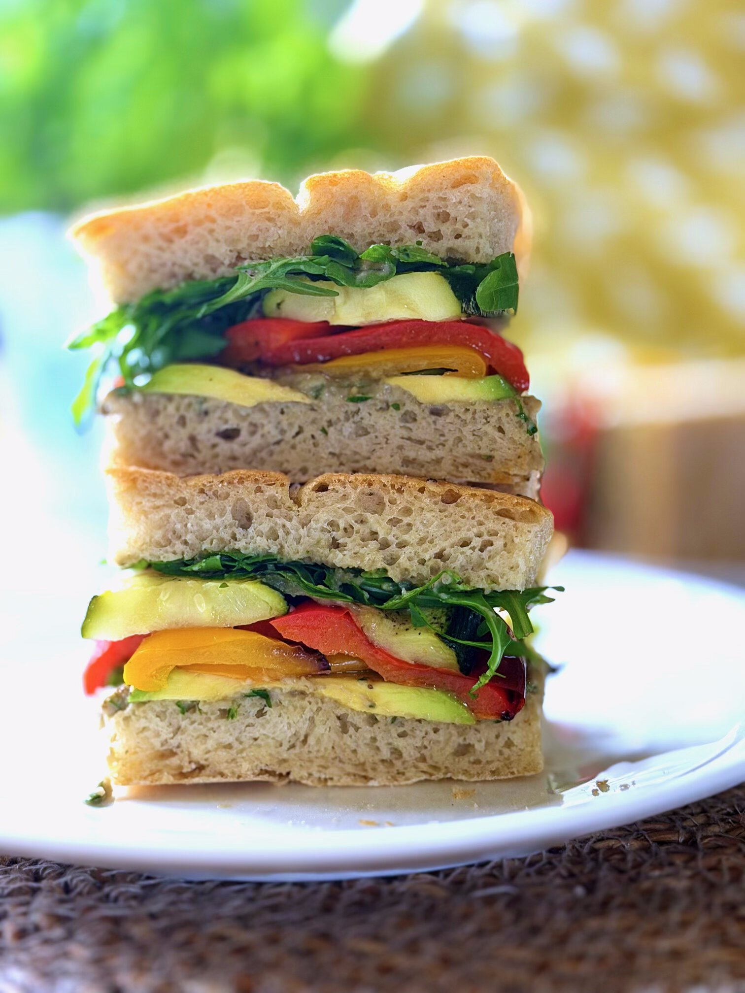 close up of roasted veg and baba ganoush sandwich