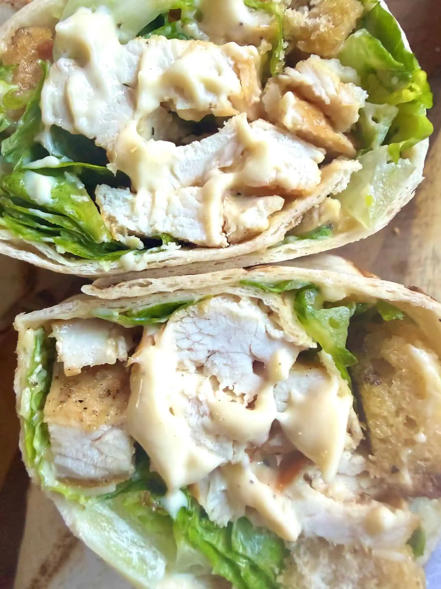 Close up of chicken Caesar salad wraps