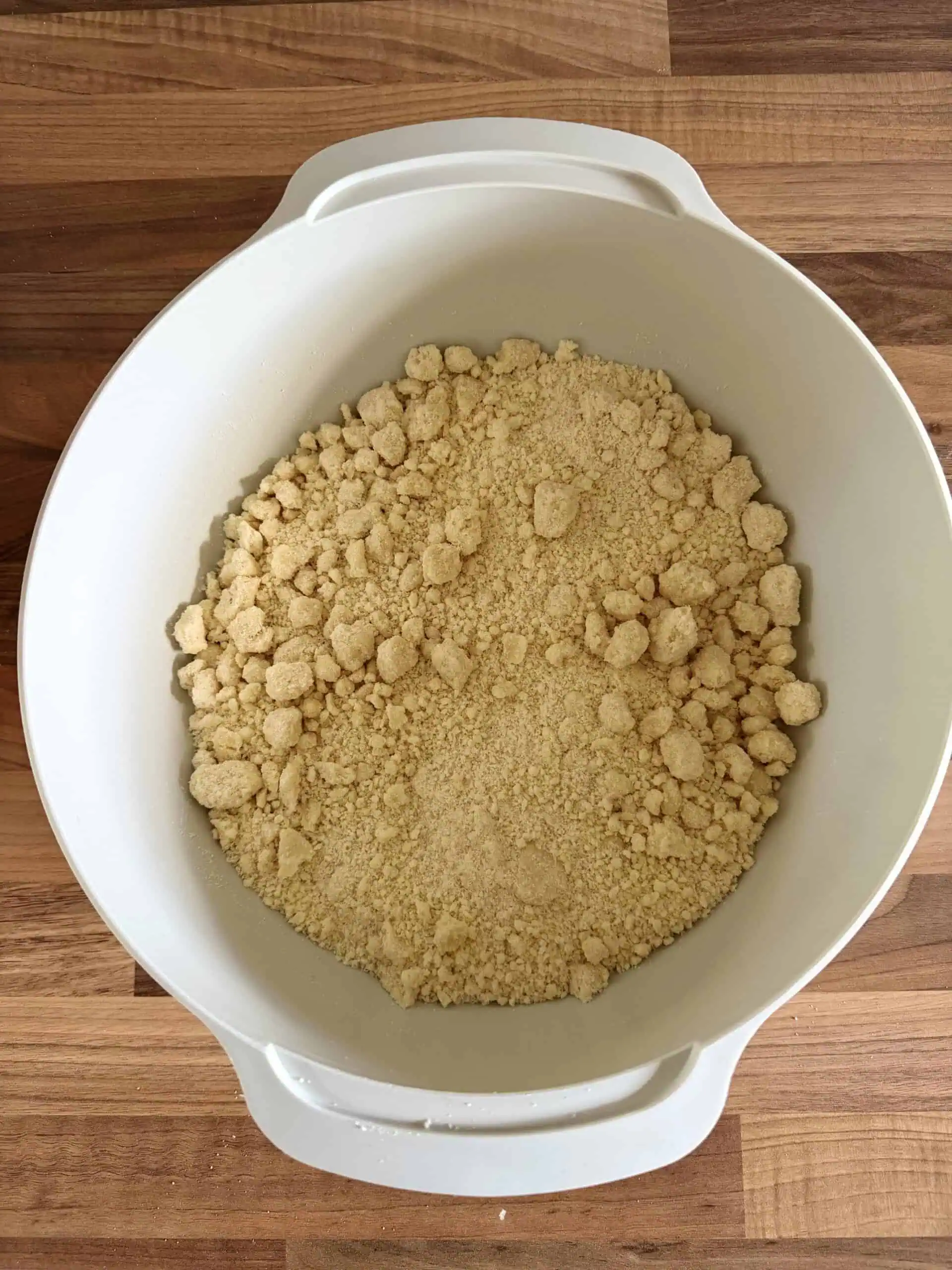 mixing the shortbread ingredients in a mixing bowl