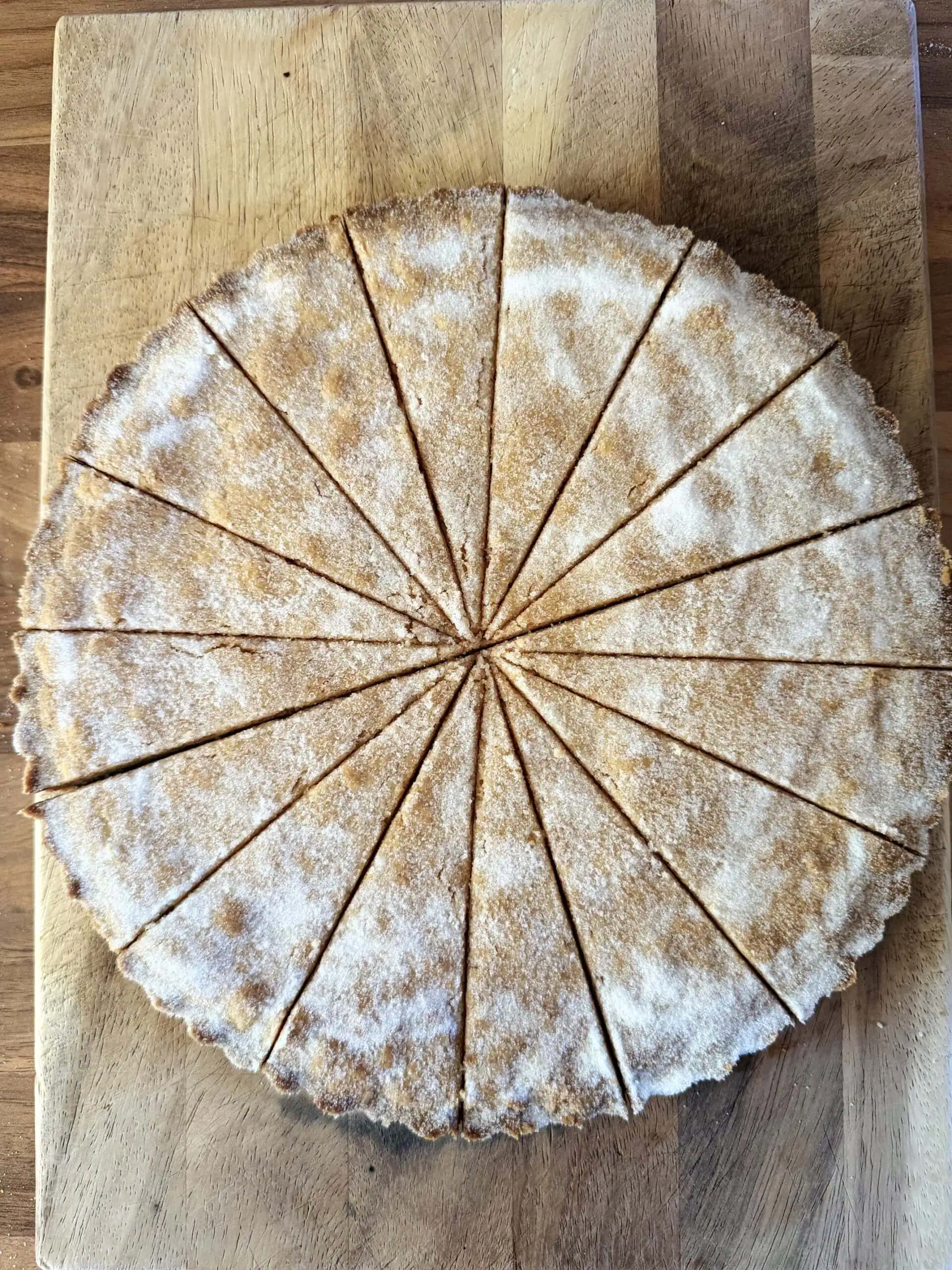 cover in sugar and slice shortbread into wedges