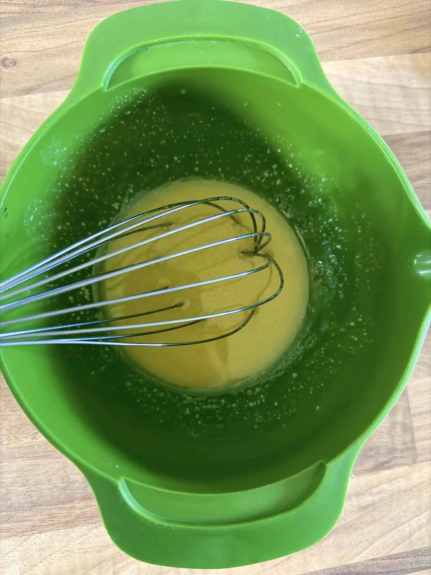 Whisking Dijon salad dressing