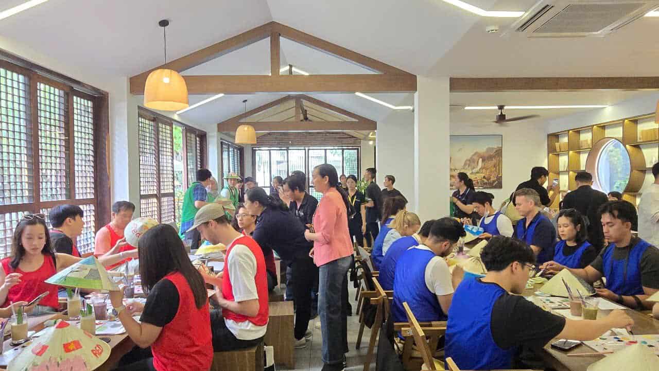 International travelers joining a Vietnam cultural experience workshop with Dasaque in Ho Chi Minh City