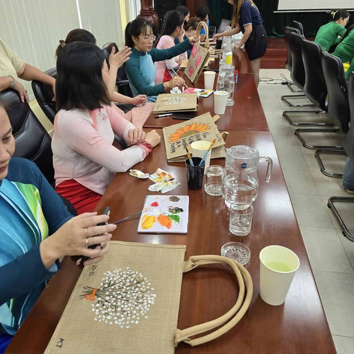 Grass bag painting workshop in Ho Chi Minh City for tour groups and travel agencies