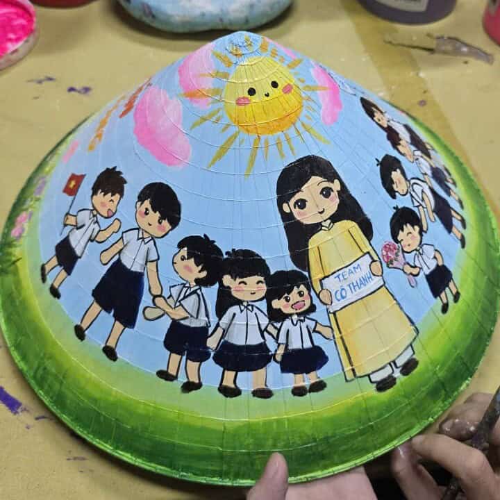 Personalized chibi painting on a conical hat made from customer photo