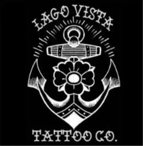 Lago Vista Tattoo Co. logo featuring an anchor, flower, and surfboard design.