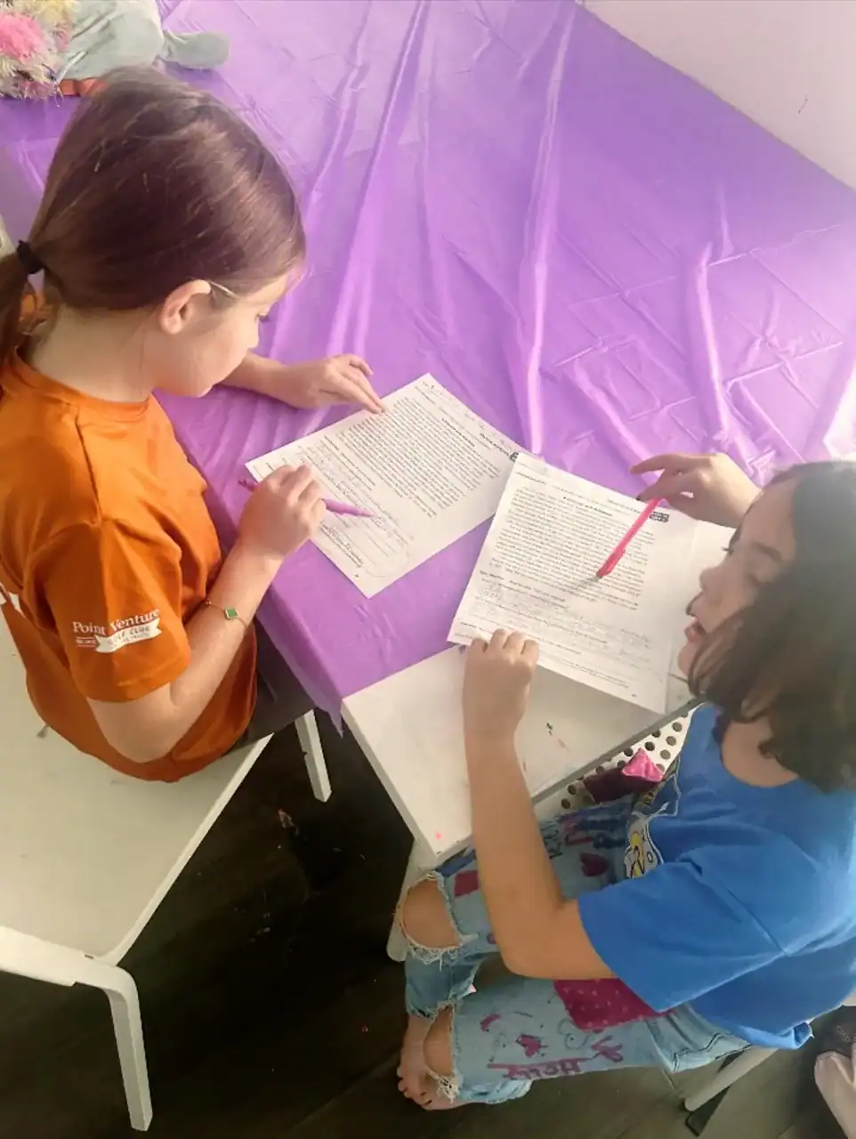 Children studying together at after school program.