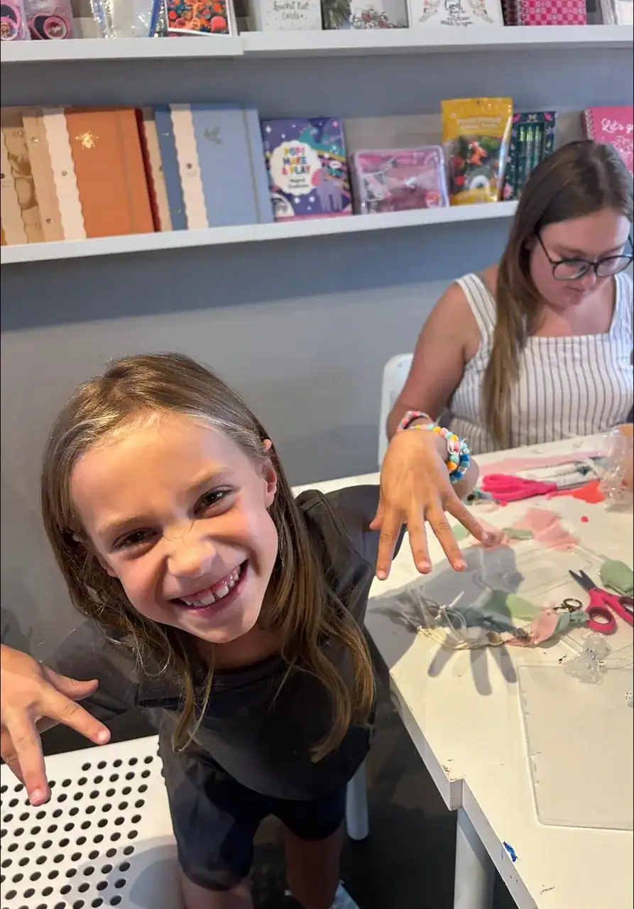 Kids engaging in arts and crafts activities after school.
