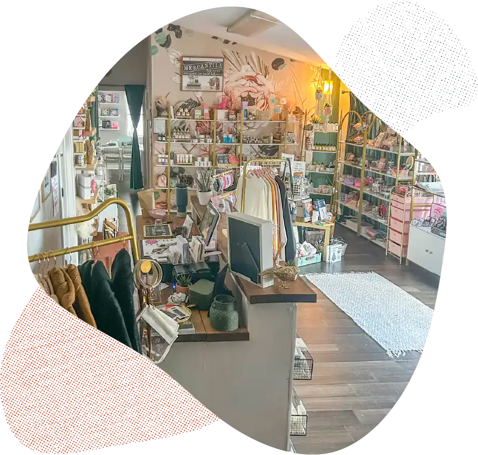 Bright boutique shop showcasing jewelry, accessories, and gifts with organized shelves and stylish d.