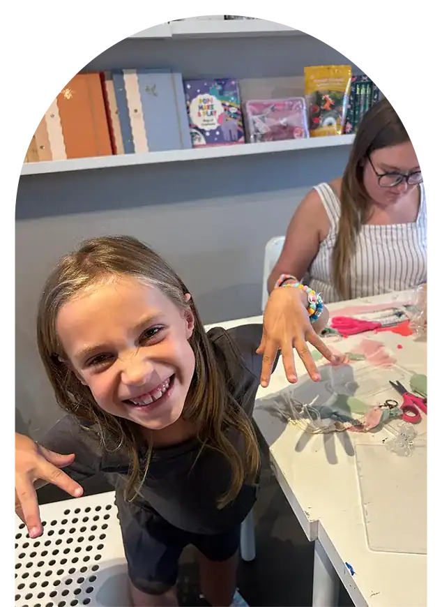 Kids engaging in arts and crafts activities after school.