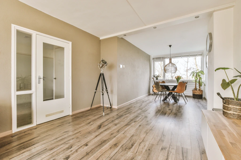 Modern living room with large windows and stylish decor in San Jose.